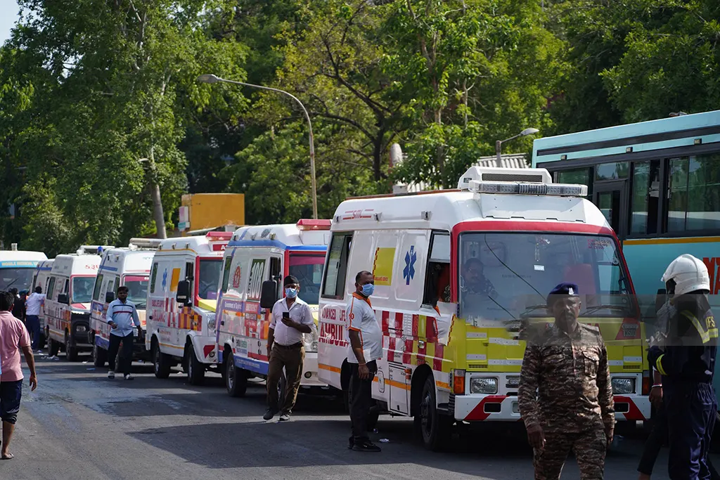 air-india-ai171-plane-crash-ahmedabad Emergency services and rescue personnel at the crash site of Air India Flight AI171