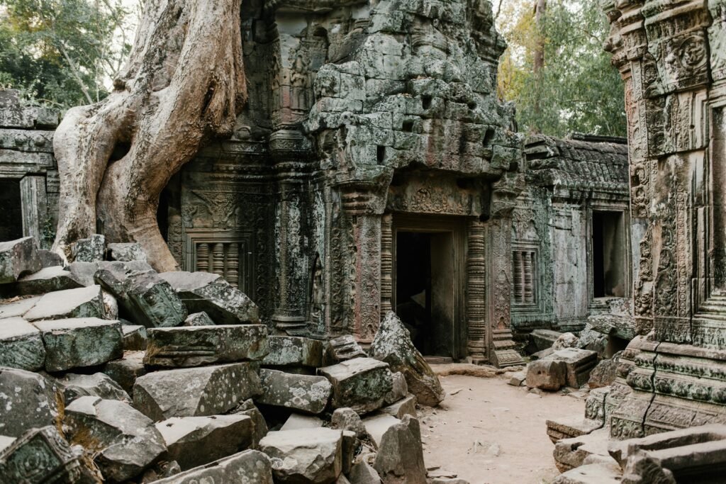 pexels-photo-5769409-5769409 Explore the mystical ruins of Ta Prohm Temple engulfed by nature in Cambodia.