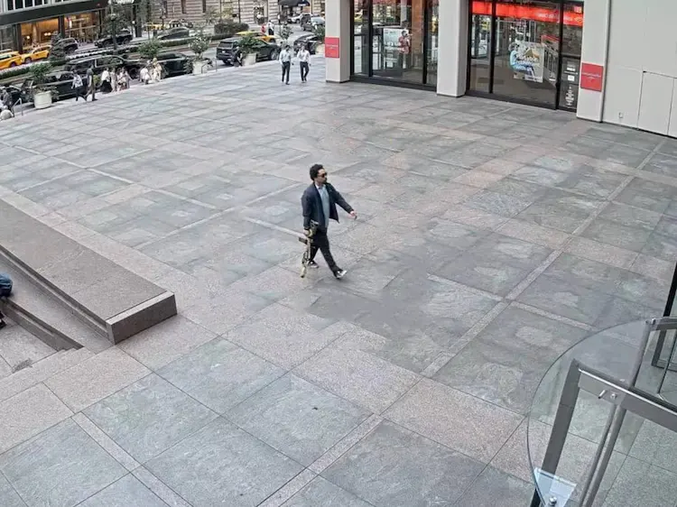 nypd-officer-killed-midtown-shooting-victims Police tape and a somber scene in Midtown Manhattan, depicting the aftermath of the shooting incident at 345 Park Avenue