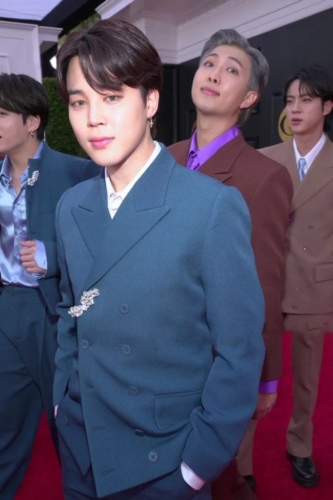 bts-jimin-seoul-music-awards-2025-louis-vuitton-blue-suit BTS’s Jimin at Seoul Music Awards 2025 in a custom white Louis Vuitton suit with pearl jewelry, a viral genderless fashion statement.