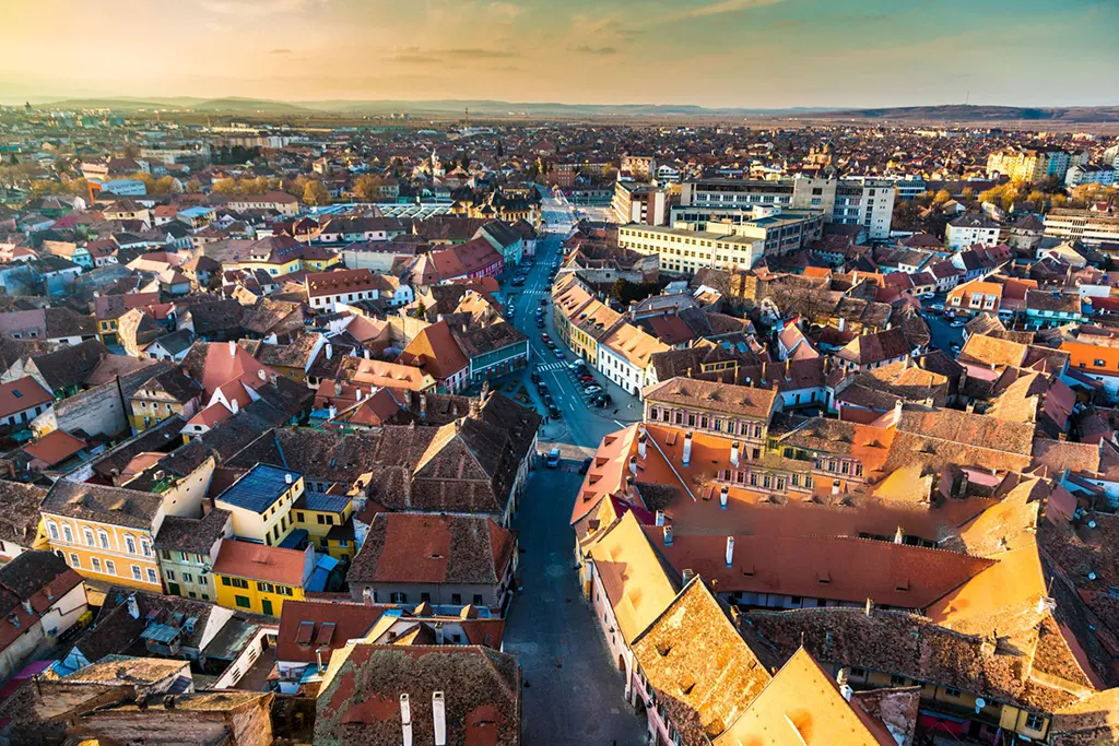 sibiu-romania-hidden-town-drone-shot 10. Colorful rooftops and Gothic architecture in Sibiu, Romania.