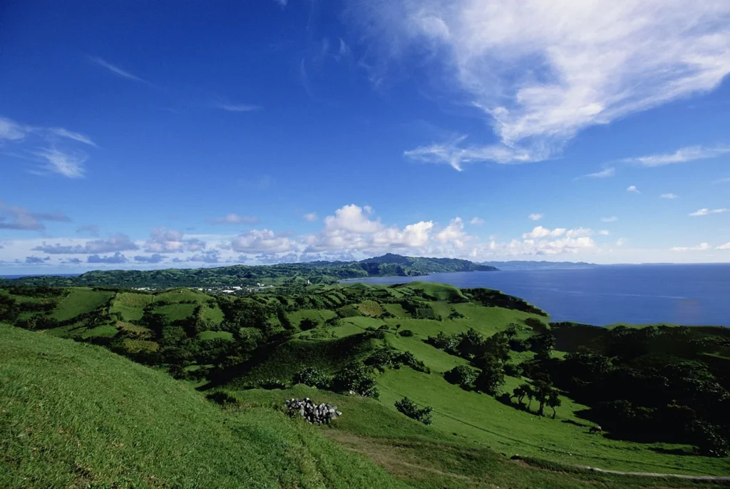 Basco Philippines island cliffs eroding from shifting typhoon paths